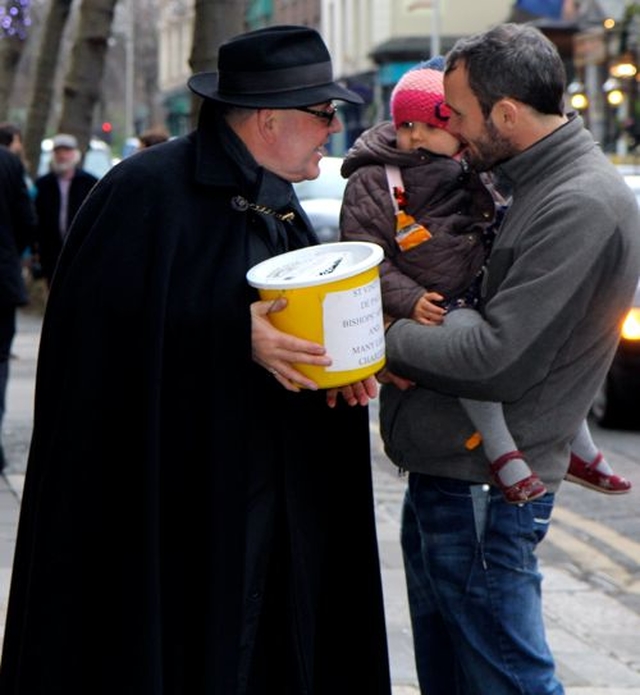 St Ann’s caretaker, Fred Deane, collects outside the church at the launch of the 2013 Black Santa Appeal earlier today (December 18). The sit out continues until Christmas Eve. 