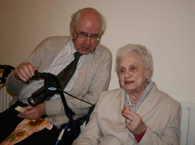 Dean Cecil Faull & Daphne Ebbs at a reception following the Rediciation of the Mageough Home Chapel.