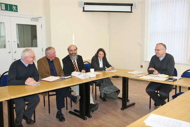 Staff pictured at a meeting at the Church of Ireland Theological Institute. 