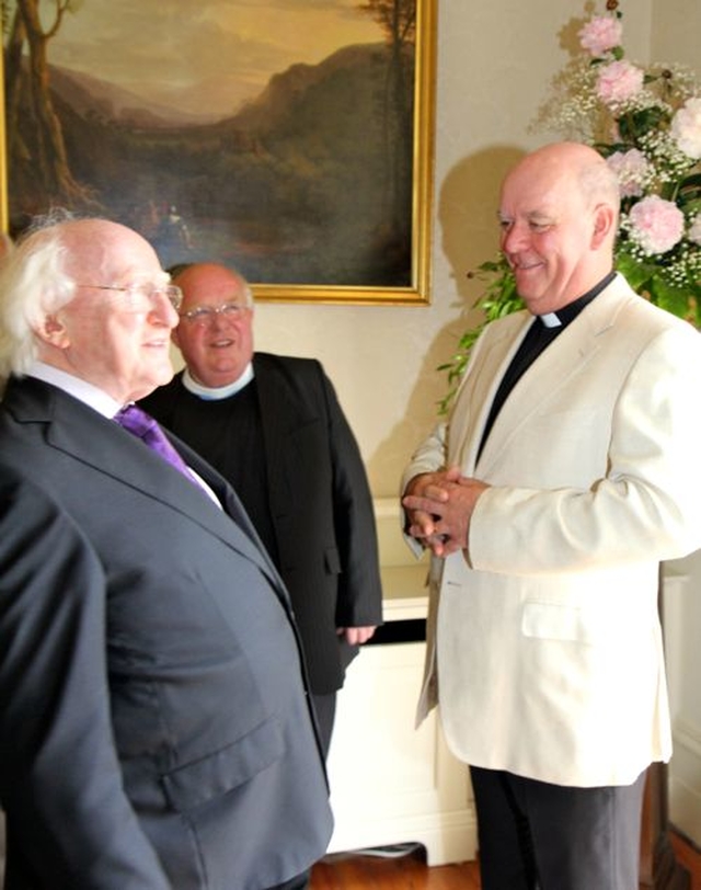 President Michael D Higgins and Archdeacon Ricky Rountree during Cumann Gaelach na hEaglaise’s visit to Áras an Uacharáin. 