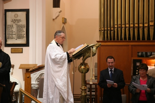 The Dean of St Patrick's and the Incumbent of the St Patrick's Cathedral group of parishes, the Very Revd Dr Robert MacCarthy reads the Gospel at the institution of the Revd Canon Mark Gardner as Vicar of the Cathedral group in St Catherine's Church, Donore Avenue.