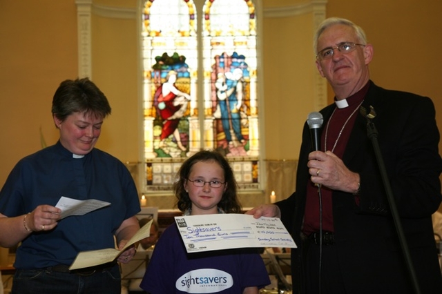 Pictured is the Archbishop of Dublin, the Most Revd Dr John Neill receiving a cheque on behalf of Sightsavers International for EUR 10,000, the Proceeds of the Sunday School Society's Lenten Campaign. The presentation took place at a special concert in Rathfarnham to mark 200 years of the society's existence. 