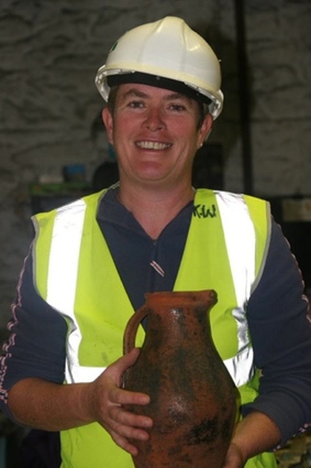 Archaeologist Lyndsey Simpson of Margaret Gowan and Co Ltd Archaeologists with a jug retrieved intact from a dig at Kevin Street Garda Station which was originally the palace of St Sepulchre's which was the residence of the Archbishop of Dublin from the late 12th century until 1806.