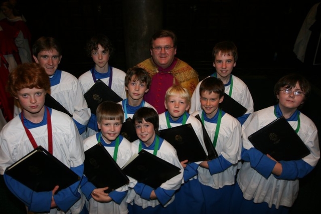 The Very Revd Canon John Flaherty with choristers that received awards from the RSCM (Royal School of Church Music) in Christ Church Cathedral.