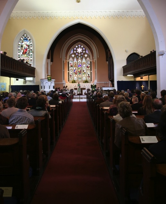 Pictured are the congregation in Taney Parish church for a Eucharist marking the 25 Anniversary of the Institution of the Revd Canon Des Sinnamon.