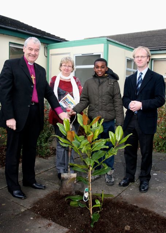 A tree was planted in the courtyard of St Maelruain’s Church of Ireland School in Tallaght to mark the 30th birthday of the school. One of the pupils who was also celebrating his birthday helped plant the tree. He is pictured with Archbishop Michael Jackson, principal Berna Daly and chairman of the board, David Hutchinson Edgar. 