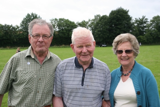 Pictured at the Donaghmore Parish fete and sports day are the Revd Gerry Sproule (centre), Rector of Lisburn (retired) and Derek and June Hohn from Greystones.