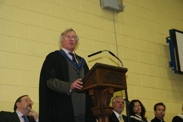 The acting Principal of Kings Hospital, Glascott Symes addresses the students and parents on the schools' Charter Day festivities.