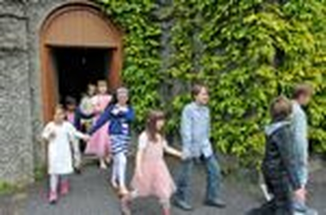 Pupils leave Drumcondra Church singing ‘School Around the Corner’ after the service to mark the reopening of the newly refurbished and extended Drumcondra National School.