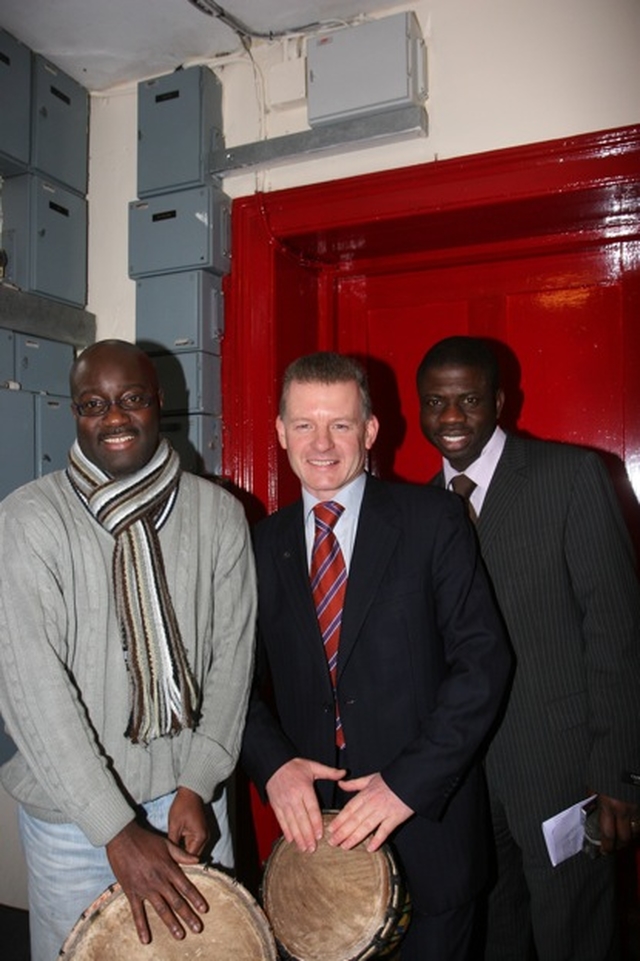 Trevor Sargent TD (centre), Minister for Horticulture and Food on the drums with Kwame Nakum (left) and Pastor Kola at the launch of Fáilte Balbriggan in the former St George's National School building.