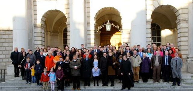 The Revd Darren McCallig and his wife, Analise, with their family, friends and well wishers following Darren’s last service as Dean of Residence and Church of Ireland Chaplain of TCD. 