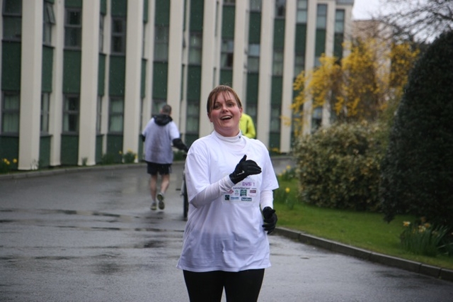 Ordinand at the Church of Ireland Theological Institute Nicola Halford finishes her run and cycle for charity at the Institute.