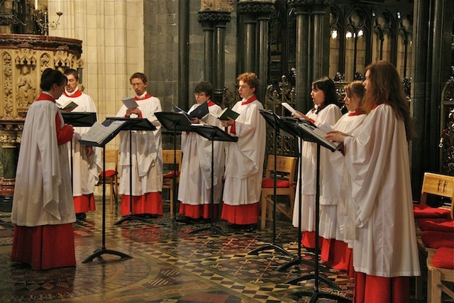 The cathedral choir singing at Chrism Eucharist on Maundy Thursday in Christ Church Cathedral.