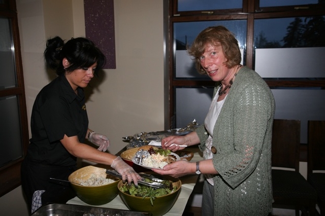 Pictured is Janet Grey (right) receiving food at the Narraghmore and Timolin with Castledermot and Kinneagh Parish BBQ in Crookstown Inn.