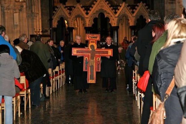 Archbishop Michael Jackson and Archbishop Diarmuid Martin carry the Taizé cross down the aisle of Christ Church Cathedral as they embark on the Ecumenical Procession of the Cross through the streets of Dublin to the Pro–Cathedral on Good Friday.