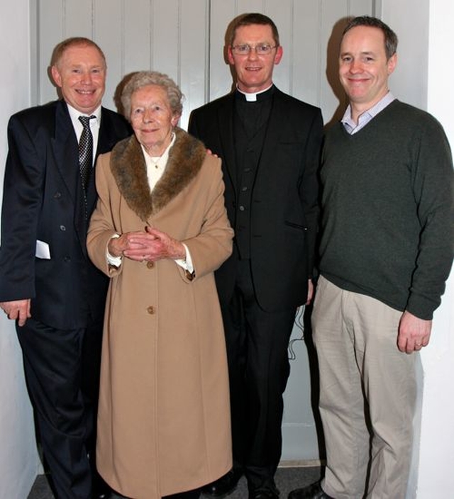 Canon Mark Gardner with his mother, Isabel, and brothers Stephen and John following his institution as rector of the new parish of St Catherine and St James with St Audoen. 