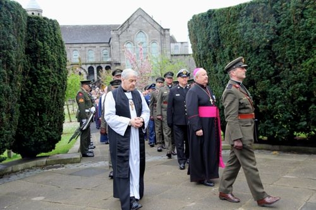 Archbishop Michael Jackson is led through the military guard of honour from the Church of the Most Sacred Heart to the Memorial for the 1916 Leaders at Arbour Hill, Dublin, during the annual 1916 Commemoration which took place this morning (Wednesday May 8). 