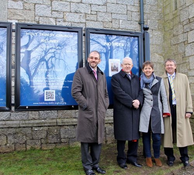 Carl, Ernest Cheryl and Rodney Smyth beside the noticeboard which was presented by Ernest Smythe to Holy Trinity, Killiney, in memory of his wife, Lillian (Babs) Smythe, and which was dedicated on Sunday February 2. 