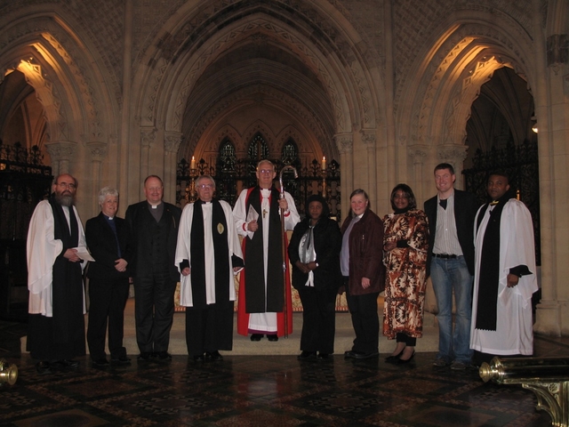 Members of the Discovery Committee following their re-dedication by the Archbishop of Dublin (centre).