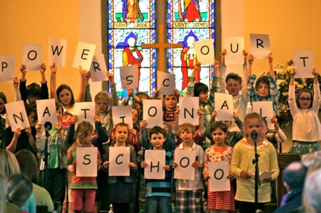 The children of Powerscourt National School take part in their Acrostic Poem specially written by first, second and third class for the dedication of their new school building. 