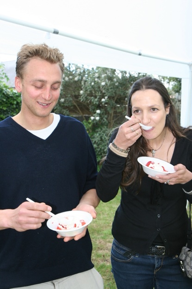 Lúach Hardiman and Saibhibhín Hardiman enjoying strawberries and cream at a parish strawberries and wine reception in Sandford Parish Church.