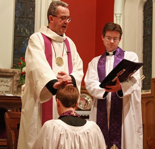 The Very Revd Dermot Dunne, Dean of Christ Church Cathedral and Guardian of Spiritualities, instituting the Revd Dr William Olhausen as Rector of Killiney-Ballybrack Parish. Photo: David Wynne