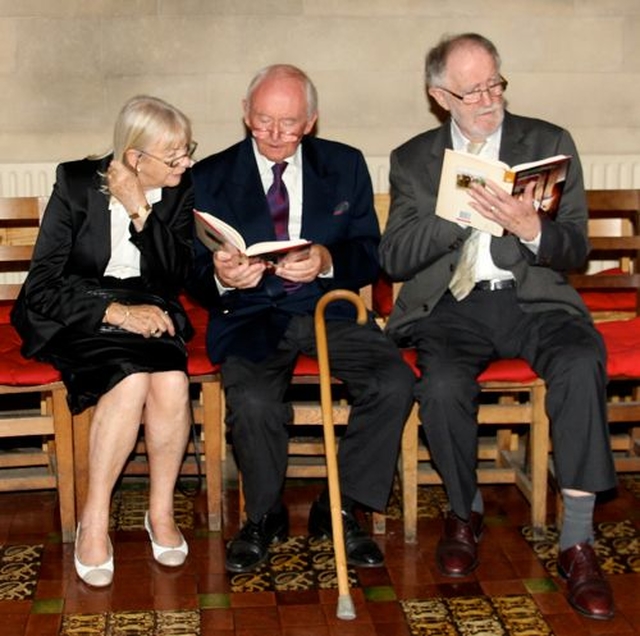 Maureen Matthews, Brendan Matthews and Bill Murphy reading ‘Donald Caird: Church of Ireland Bishop: Gaelic Churchman: a Life’. Brendan and Bill feature in the biography. 