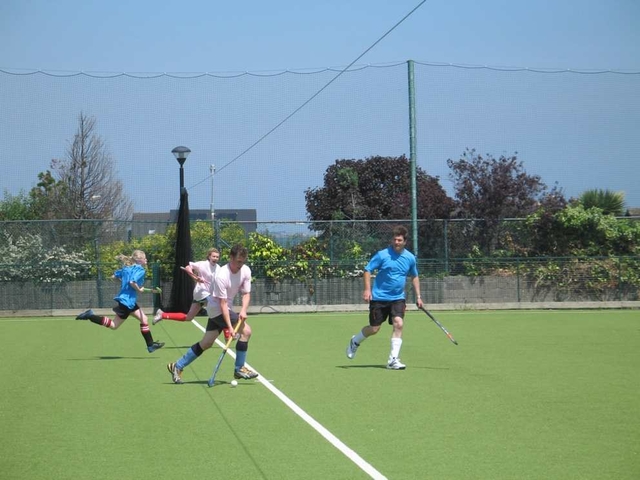 St Paul's Glenageary (in Pink) on the attack against Rathfarnham (Blue) in the Diocesan Inter Parish Hockey Tournament. St Paul's won the match 2-0.