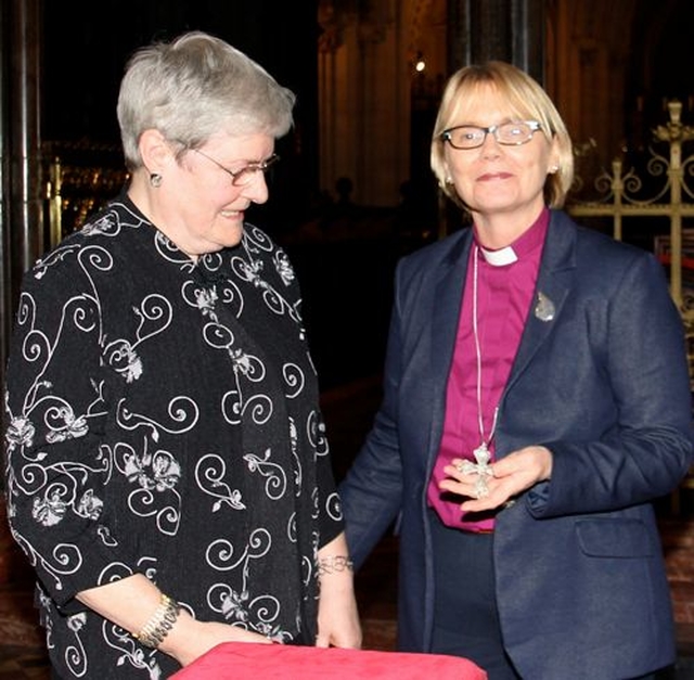 Julia Turner presented Bishop Pat Storey with a silver cross left by her mother Daphne Wormell for the first woman bishop in the Church of Ireland. The event took place in Christ Church Cathedral last night (December 9)