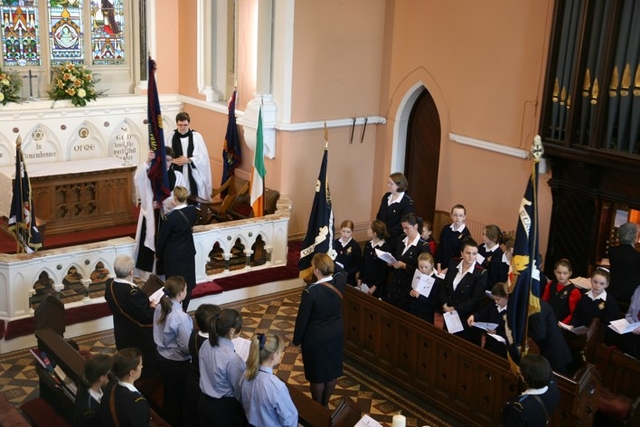 The Revd Stephen Farrell and the Revd Niall Slone receive the colours at the annual Girls' Brigade Carol Service in Taney parish.