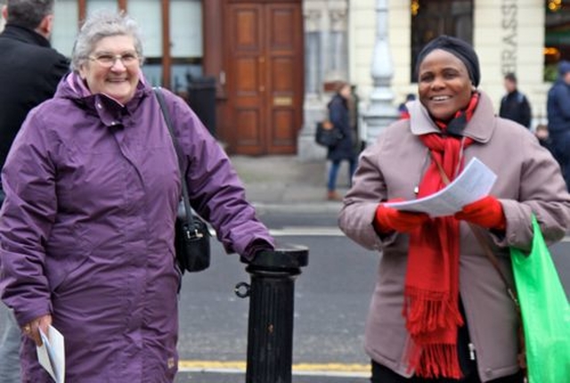 Jean Denner and Stella Obe at the Community Carol Singing at the Mansion House. 