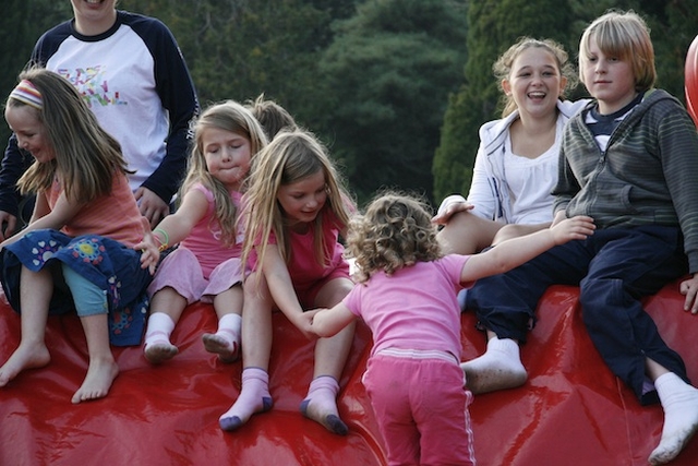 A helping hand on the bouncing castle!