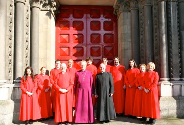 Members of St Ann’s Choir with the Bishop of Tuam, the Rt Revd Patrick Rooke; the Vicar of St Ann’s, the Revd David Gillespie; and the Musical Director of St Ann’s, Charles Marshall outside the Dawson Street church following the three hour Good Friday Service at which Bishop Rooke gave the reflections. 