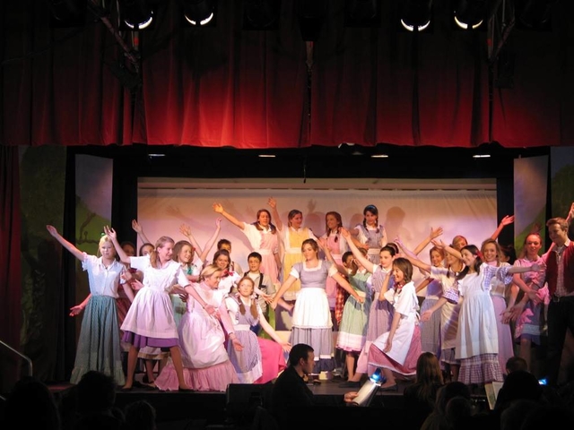 The cast of the St Paul’s Parish theatre group entertain the audience with songs from Okalahoma.