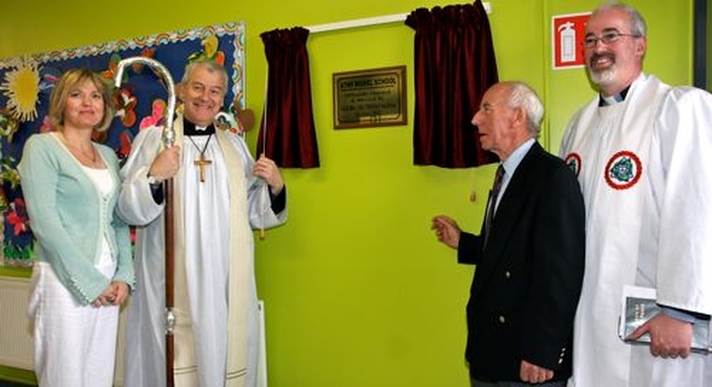 Archbishop Michael Jackson and chairman of the board of management, Ron Condell, unveil a plaque in the hall of the new Athy Model School. Also pictured are school principal, Yvonne Griffin and rector of Athy, Revd Cliff Jeffers. 