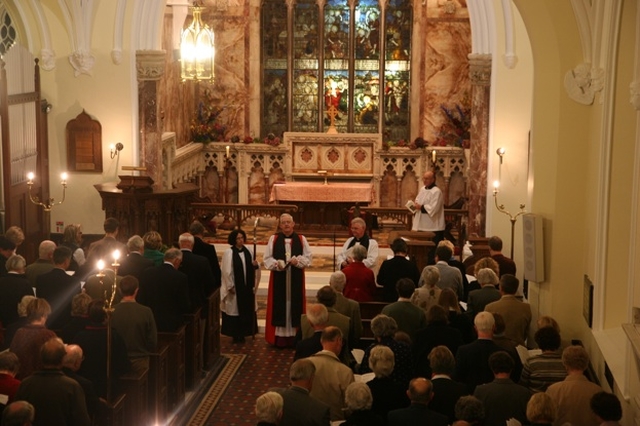 The Archbishop of Dublin and Bishop of Glendalough, the Most Revd Dr John Neill performs the re-dedication of newly refurbished stained glass and the dedication of new lighting in Nuns Cross Church, Killiskey, near Ashford, Co Wicklow.