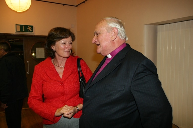 The former Archbishop of Armagh, the Rt Revd Robin Eames with Heather Waugh at a reception following the Delgany Harvest Festival.