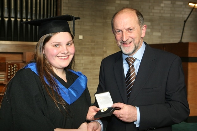 Jennifer Veighey from Rathcoole, Dublin receives the Vere Foster Gold Medal as the student who received the highest marks in Teaching Practice from Declan  Kelleher, President of the INTO at the graduation day celebrations at the Church of Ireland College of Education.