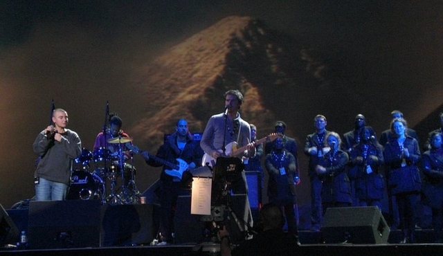 The Discovery Gospel Choir on stage with Sinead O’Connor at the Meteor Music awards singing “we are the people who are darker than blue”