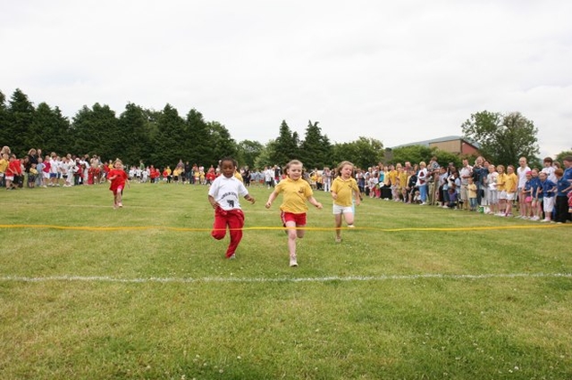 Racing for the finishing line at the West Glendalough schools sports day in Donaghmore.