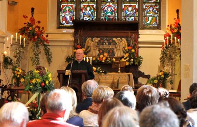 Archdeacon Ricky Rountree, Rector of Powerscourt with Kilbride, introduces the Kilbride Harvest Service which concluded the four day Festival of Fruit and Flowers in St Brigid’s Church. The choir of Christ Church Cathedral sang the service of Choral Evensong. 