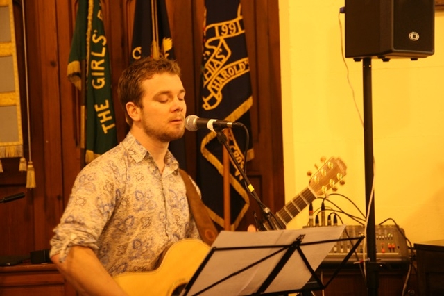 Paul Donner leading the worship in song at the institution of the Revd Rob Jones as Vicar of Rathmines and Harold's Cross.