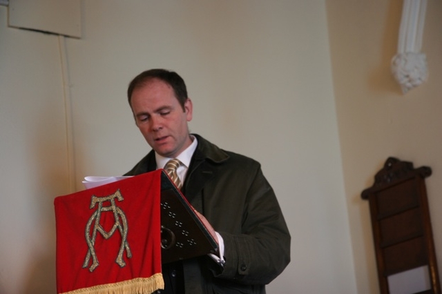 Cllr Sylvester Bourke reads the lesson at a Eucharist in Conory Church to give thanks for 150 years since the Church's foundation.