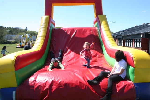 Enjoying the slide at the Family Fun Day at East Glendalough School, Wicklow.