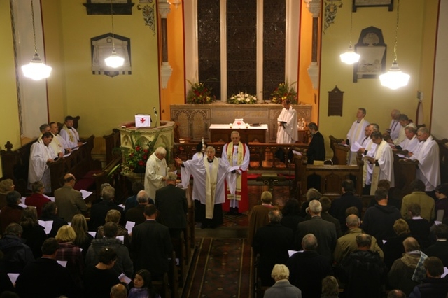 In his first act as newly instituted Rector of Rathdrum and Deralossary with Glenealy, the Revd Canon John McCullagh introduces the Peace at his institution.