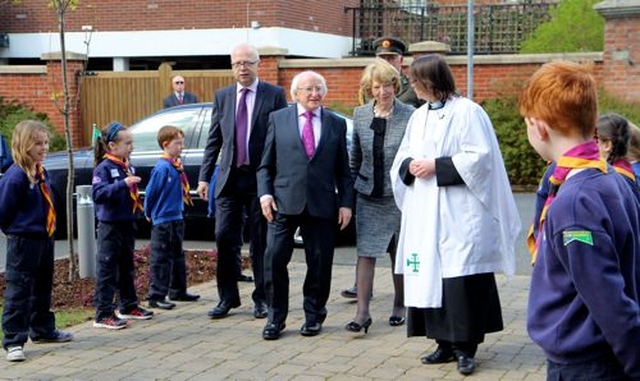 President Michael D Higgins and his wife Sabina arrive at the Church of St John the Baptist for the service commemorating the 1,000th anniversary of the Battle of Clontarf. They were greeted by the Rector, the Revd Lesley Robinson and select vestry member, John Patten and were given a guard of honour by the local Cubs and Scouts. 