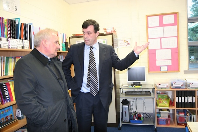 Revd Paul Houston and Minister Brian Lenihan, TD, inspect one of the new classrooms in Castleknock National School.