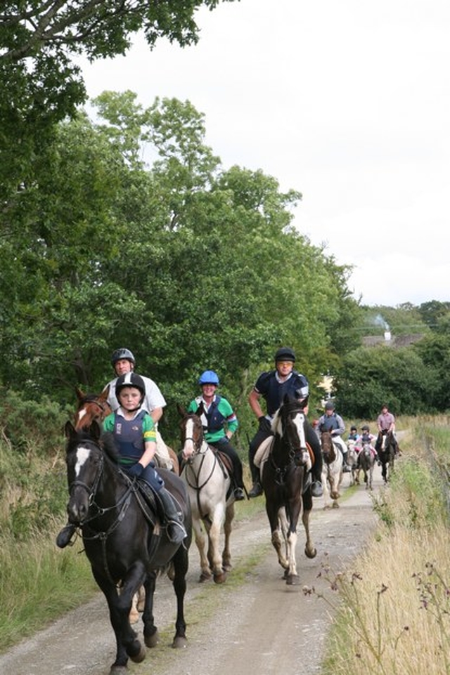 Returning on Horseback at the annual Donard and Dunlavin Parish Ride out and BBQ hosted in Moat Farm in Donard.