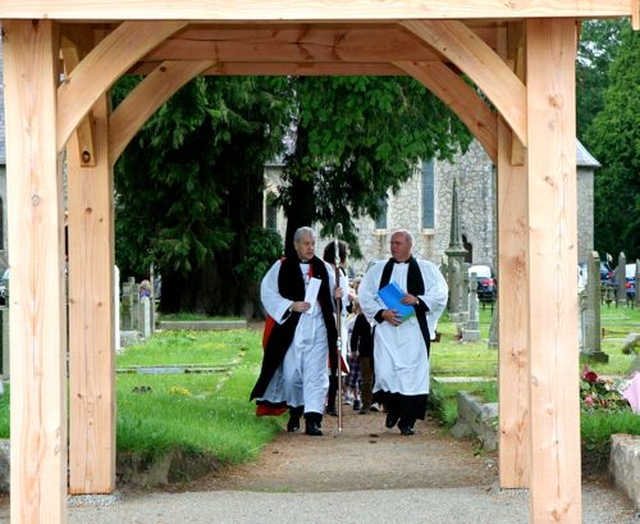 Archbishop Michael Jackson and Archdeacon Ricky Rountree lead the way from the church to Powerscourt National School to perform the official opening and dedication of the new school. 