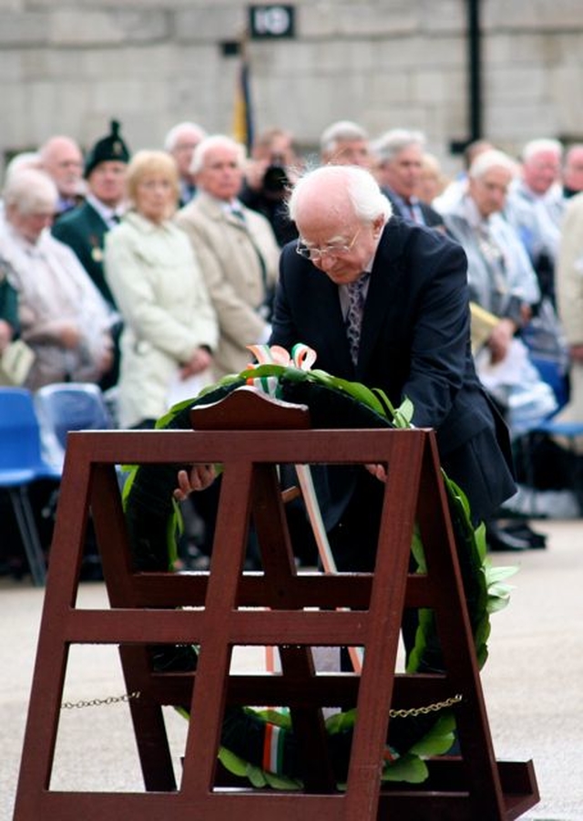 President Michael D Higgins lays a wreath at the plaque in memory of those Irishmen and Irishwomen who have died in past wars or on service with the United Nations.